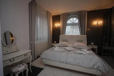 Ein Bett oder Betten in einem Zimmer der Unterkunft Hotel Da Gianni GmbH