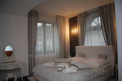 Ein Bett oder Betten in einem Zimmer der Unterkunft Hotel Da Gianni GmbH