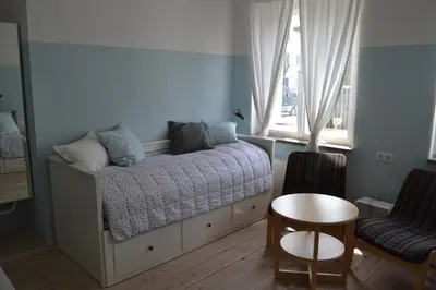 Ein Bett oder Betten in einem Zimmer der Unterkunft Wassersportzentrum Alte Feuerwache