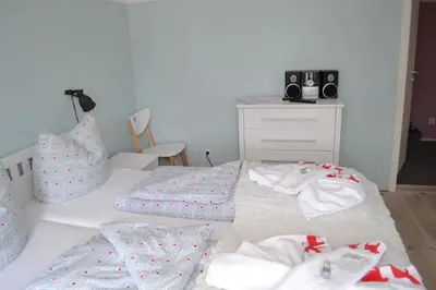 Ein Bett oder Betten in einem Zimmer der Unterkunft Wassersportzentrum Alte Feuerwache