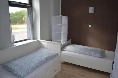 Ein Bett oder Betten in einem Zimmer der Unterkunft Wassersportzentrum Alte Feuerwache