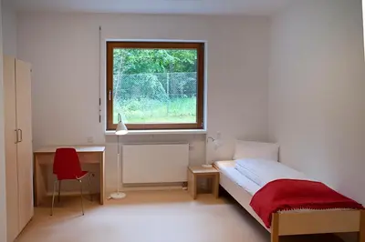 Ein Bett oder Betten in einem Zimmer der Unterkunft Umwelt Bildungszentrum Berlin