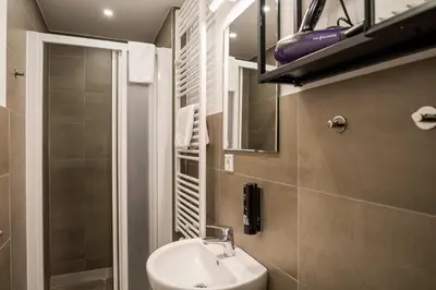Ein Badezimmer in der Unterkunft Fantastic Loft with Balcony