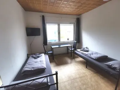 Ein Bett oder Betten in einem Zimmer der Unterkunft Monteur-Haus Marat Berlin Biesdorf / Marzan / Hellersdorf