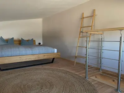 Ein Bett oder Betten in einem Zimmer der Unterkunft Ferienwohnung Pferdehof Birkholz