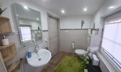 Ein Badezimmer in der Unterkunft Casa Mia 183 am See