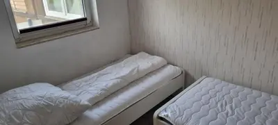 Ein Bett oder Betten in einem Zimmer der Unterkunft Casa Mia 40 am See