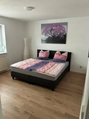 Ein Bett oder Betten in einem Zimmer der Unterkunft Ferienhaus 