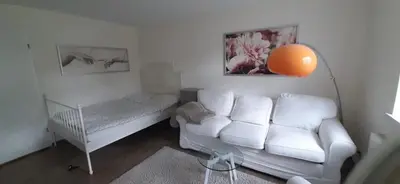 Ein Bett oder Betten in einem Zimmer der Unterkunft Ferienwohnung An der Fangschleuse