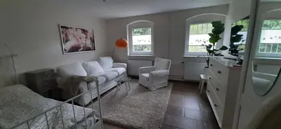 Ein Sitzbereich in der Unterkunft Ferienwohnung An der Fangschleuse