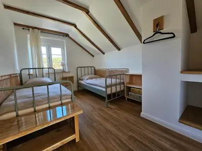 Ein Bett oder Betten in einem Zimmer der Unterkunft Holz9
