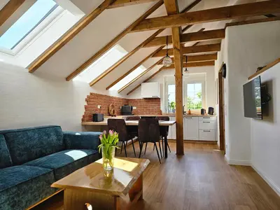 Ein Sitzbereich in der Unterkunft Holz9