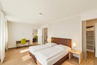 Ein Bett oder Betten in einem Zimmer der Unterkunft ADAPT APARTMENT HOTEL BERLIN - Adlershof