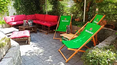 Ein Sitzbereich in der Unterkunft Marleen`s Bar und Zimmer