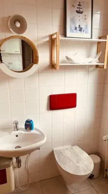 Ein Badezimmer in der Unterkunft Ferienhaus mit Seeblick
