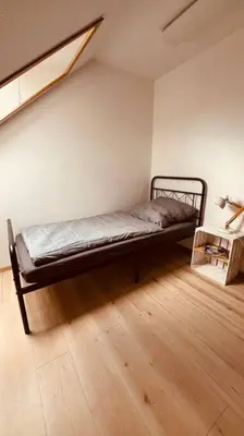Ein Bett oder Betten in einem Zimmer der Unterkunft Ferienhaus mit Seeblick