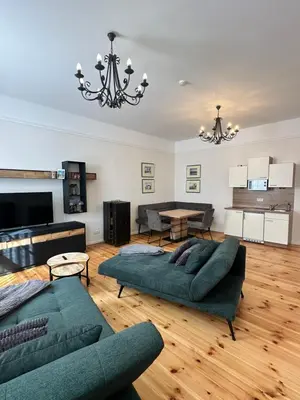 Ein Sitzbereich in der Unterkunft Apartmenthaus Gutenberg 78