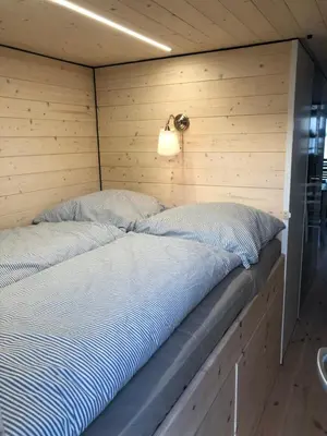 Ein Bett oder Betten in einem Zimmer der Unterkunft Waterfront Loft