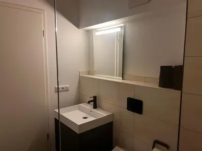 Ein Badezimmer in der Unterkunft Hideaway am Plessower See