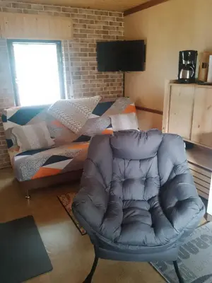 Ein Sitzbereich in der Unterkunft Spreehaus