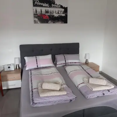 Ein Bett oder Betten in einem Zimmer der Unterkunft Gästezimmer Melz