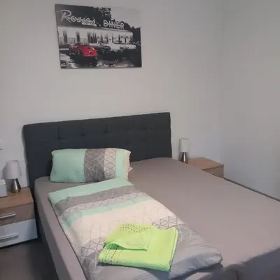 Ein Bett oder Betten in einem Zimmer der Unterkunft Gästezimmer Melz