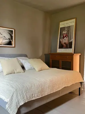 Ein Bett oder Betten in einem Zimmer der Unterkunft Lakeside Studio – Haus mit Seezugang