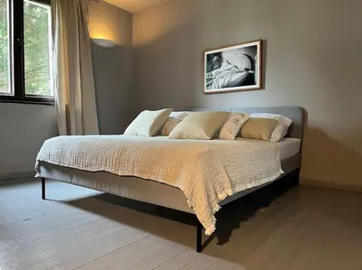 Ein Bett oder Betten in einem Zimmer der Unterkunft Lakeside Studio – Haus mit Seezugang