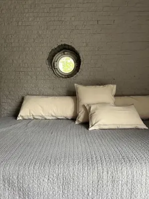 Ein Bett oder Betten in einem Zimmer der Unterkunft Lakeside Studio – Haus mit Seezugang