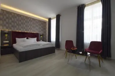 Ein Bett oder Betten in einem Zimmer der Unterkunft Hotel Grand Inn Berlin - Weißensee
