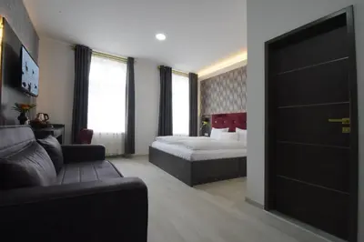 Ein Bett oder Betten in einem Zimmer der Unterkunft Hotel Grand Inn Berlin - Weißensee