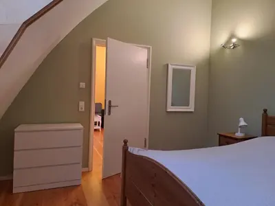 Ein Bett oder Betten in einem Zimmer der Unterkunft Inspektorhaus-Behlendorf