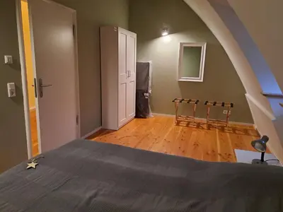 Ein Bett oder Betten in einem Zimmer der Unterkunft Inspektorhaus-Behlendorf