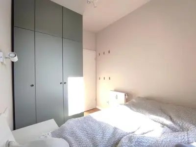 Ein Bett oder Betten in einem Zimmer der Unterkunft Urban Jungle Retreat