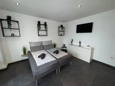 TV/Unterhaltungsangebot in der Unterkunft Suite Julius Cesar mit Private Sauna & Whirlpool