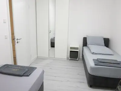 Ein Bett oder Betten in einem Zimmer der Unterkunft Elvano Apartments