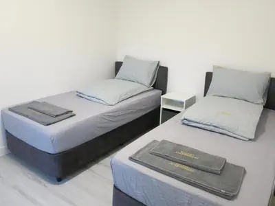 Ein Bett oder Betten in einem Zimmer der Unterkunft Elvano Apartments