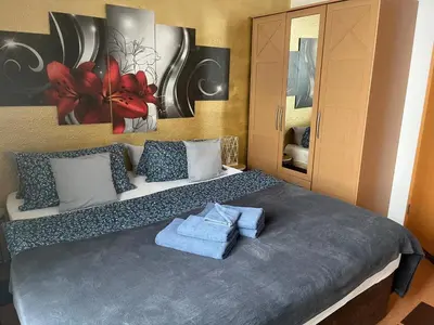 Ein Bett oder Betten in einem Zimmer der Unterkunft Kulinarische Zauberei