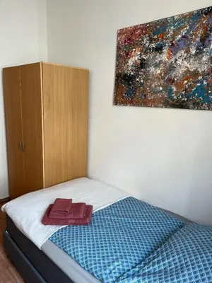 Ein Bett oder Betten in einem Zimmer der Unterkunft Kulinarische Zauberei