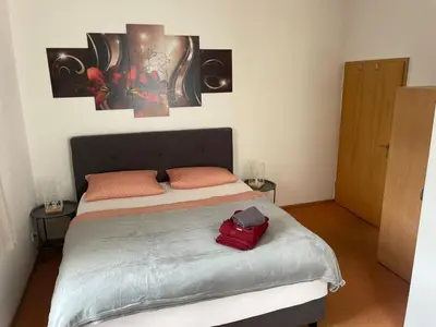 Ein Bett oder Betten in einem Zimmer der Unterkunft Kulinarische Zauberei