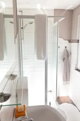 Ein Badezimmer in der Unterkunft Bungalow mit Wintergarten