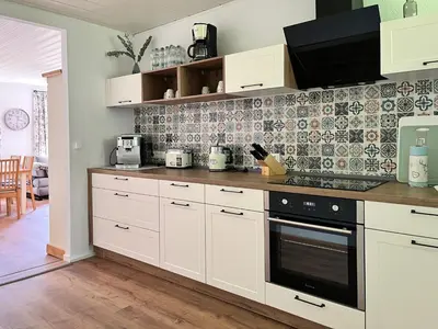 Küche/Küchenzeile in der Unterkunft Ferienhaus im Wald, am Briesener See