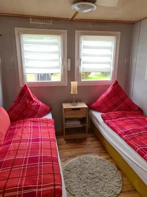 Ein Bett oder Betten in einem Zimmer der Unterkunft Kleine Ferienwohnung in der Natur