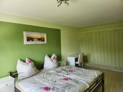 Ein Bett oder Betten in einem Zimmer der Unterkunft Ferienhaus Naturpur Chorin