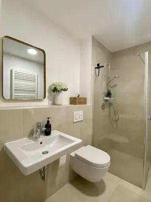 Ein Badezimmer in der Unterkunft Apartment am Flughafen, Glasfaser-Internet, Waschmaschine