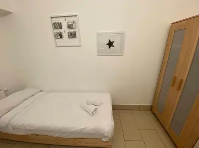 Ein Bett oder Betten in einem Zimmer der Unterkunft Private Souterrain Apartment in the green of Berlin