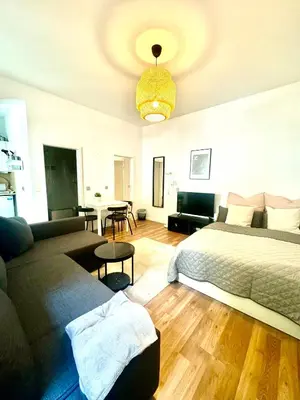 Ein Bett oder Betten in einem Zimmer der Unterkunft RED STONE Apartments Central Berlin
