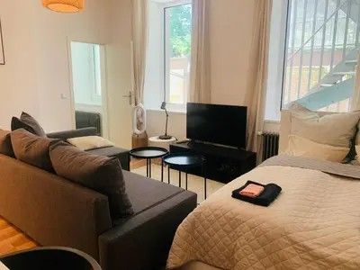 Ein Bett oder Betten in einem Zimmer der Unterkunft RED STONE Apartments Central Berlin
