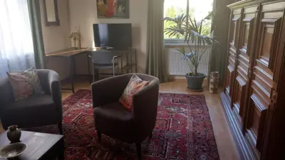 Ein Sitzbereich in der Unterkunft Ferienwohnung Luise, gemütlich, freundlich und ganz nah an Berlin