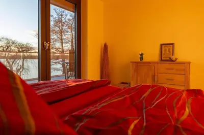 Ein Bett oder Betten in einem Zimmer der Unterkunft Ferien am Großen Wünsdorfer See